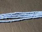 Preview: Briolette Beads, Coleur: blue irisierend, Taille: ±2x3mm, Quantite: 50 piece