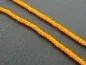 Preview: Briolette Perlen, Farbe: orange, Grösse: ±1.5x2mm, Menge: 50 Stk.
