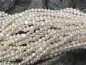 Preview: perles d'eau douce flat, Couleur: blanc, Taille: ±6-7mm, Quantite: chaîne ±36cm, (±58 piece)