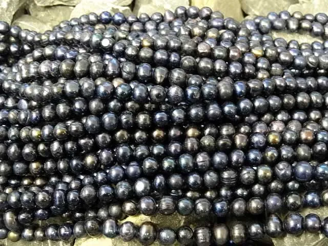 perles d'eau douce flat, Couleur: noir, Taille: ±7-8mm, Quantite: chaîne ±36cm, (±55 piece)