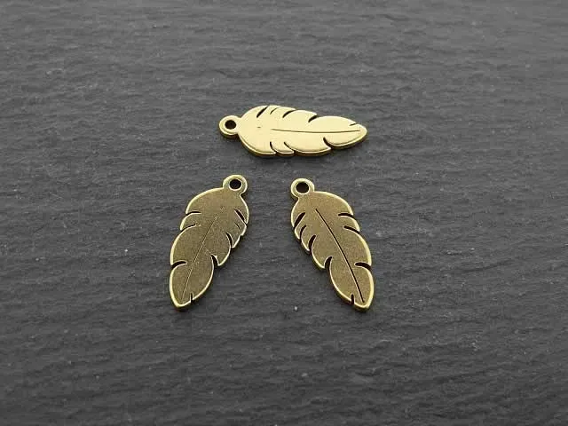 Stainless Steel Feather, Color: gold plated, Size: ±16x6mm, Qty: 1 pc.