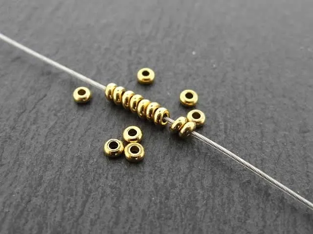 Heishi Stainless Steel Bead, Color: gold plated, Size: ±1x3mm, Qty: 8 pc.