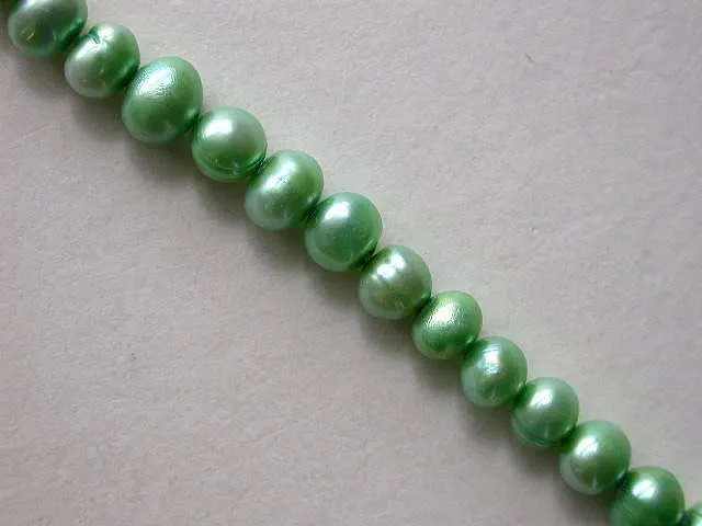 Fresh water beads, l. green, ± 6mm, string 16"