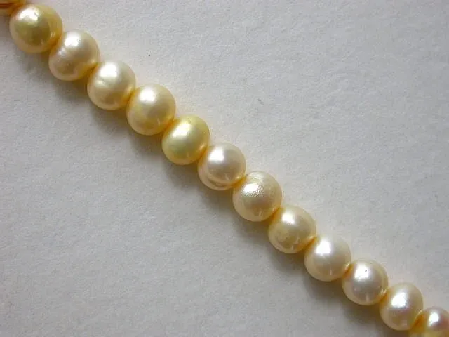 Fresh water beads, yellow, ± 6mm, string 16"