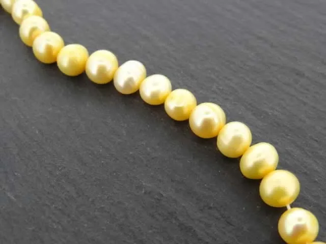 Fresh water beads, yellow, ±6mm, string 16"