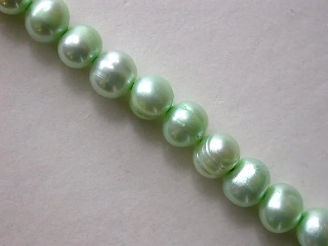 Fresh water beads, l. green, ± 8mm, string 16"