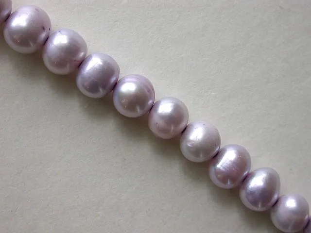 Fresh water beads, lilac, ± 8mm, string 16"