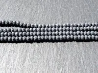 Briolette Perlen, Farbe: schwarz matt, Grösse: ±2x3mm, Menge: 50 Stk.